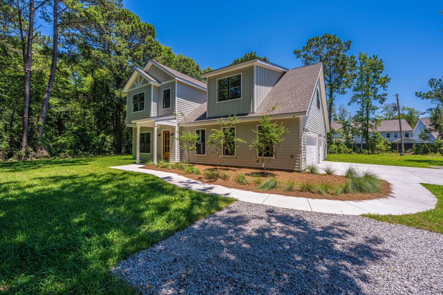 Front exterior of a new home in , Mount Pleasant, SC, highlighting curb appeal (Image 1). Front exterior of a new home in , Mount Pleasant, SC, highlighting curb appeal (Image 1).