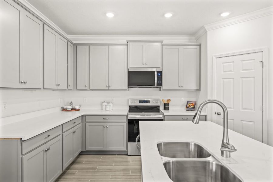 Furnished interior view inside a new home in Natureview, Freeport (Image 14).