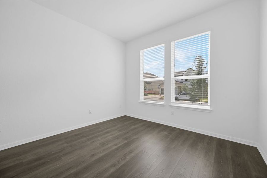 Spacious, unfurnished interior of a new home in Travisso Capri Collection, Leander (Image 9).