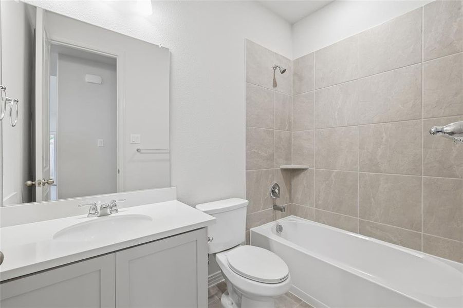 Bathroom with tub / shower combination and vanity