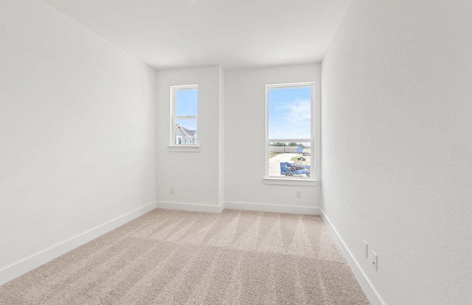 Spacious, unfurnished interior of a new home in Northpoint at Old Settlers, Round Rock (Image 14).