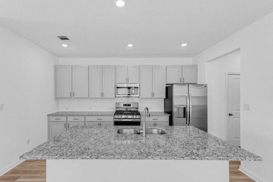 Furnished interior view inside a new home in Sunfield, Buda (Image 6).