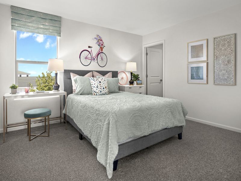 Spacious third bedroom with walk-in closet.