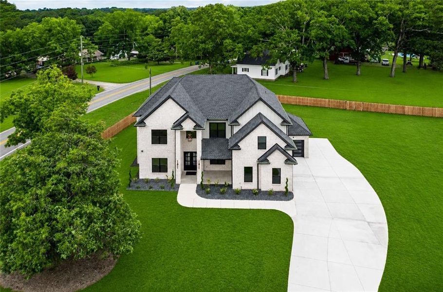 Front exterior of a new home in , Grayson, GA, highlighting curb appeal (Image 31). Front exterior of a new home in , Grayson, GA, highlighting curb appeal (Image 31).