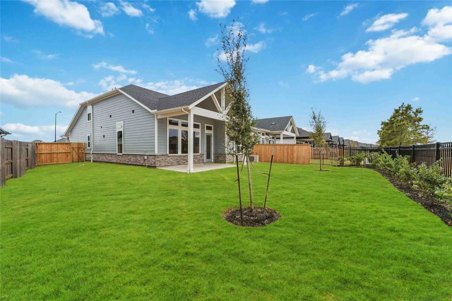 Exterior details and patio area of a home in Elyson, Katy (Image 4).