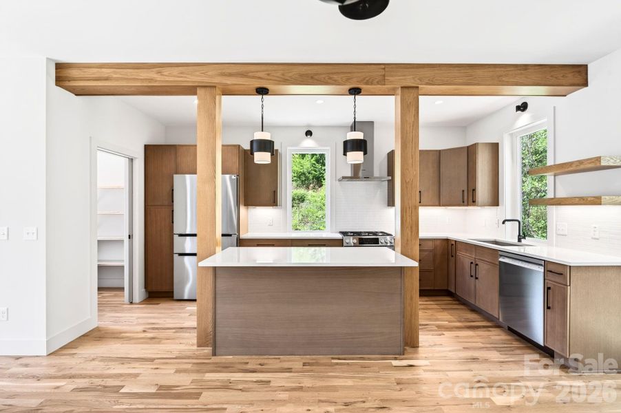Stunning Exposed and Stained Beams Frame Sparkling Kitchen