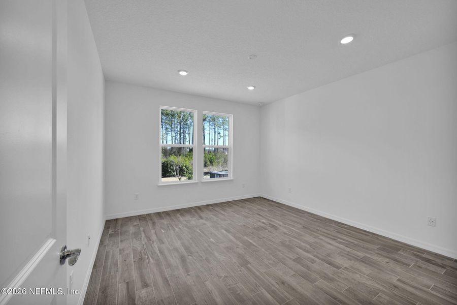 Spacious, unfurnished interior of a new home in Del Webb Wildlight, Yulee (Image 21).