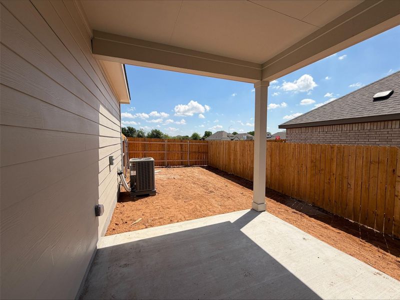 Exterior details and patio area of a home in Creeks Crossing, Elgin (Image 12).
