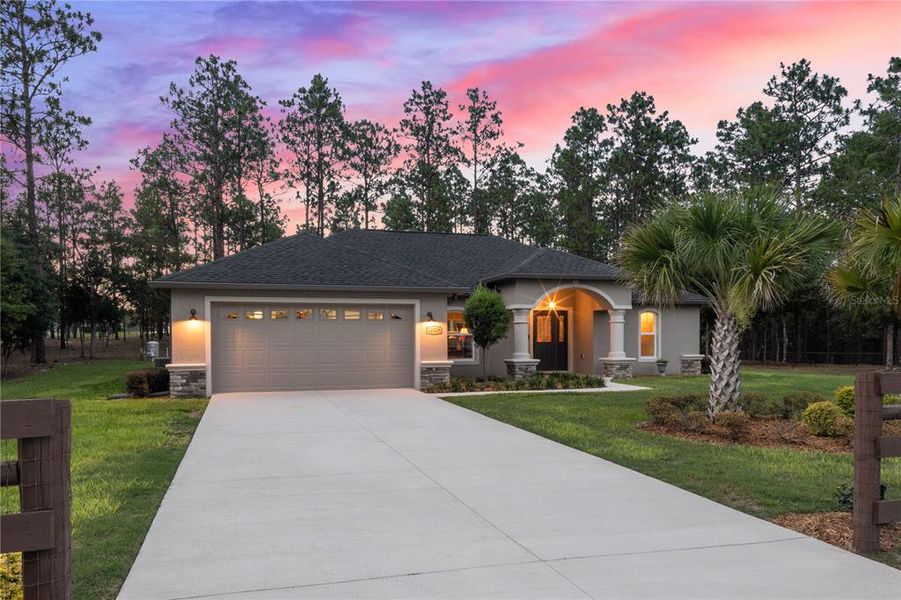 Front exterior of a new home in , Dunnellon, FL, highlighting curb appeal (Image 22).