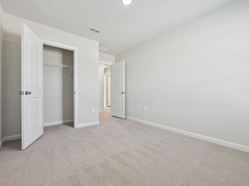 Spacious, unfurnished interior of a new home in The Rows at Buffaloe Reserve, Raleigh (Image 16). Spacious, unfurnished interior of a new home in The Rows at Buffaloe Reserve, Raleigh (Image 16).