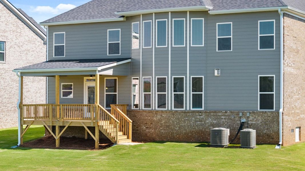 Front exterior of a new home in Heritage Pointe, Senoia, GA, highlighting curb appeal (Image 33). Front exterior of a new home in Heritage Pointe, Senoia, GA, highlighting curb appeal (Image 33).