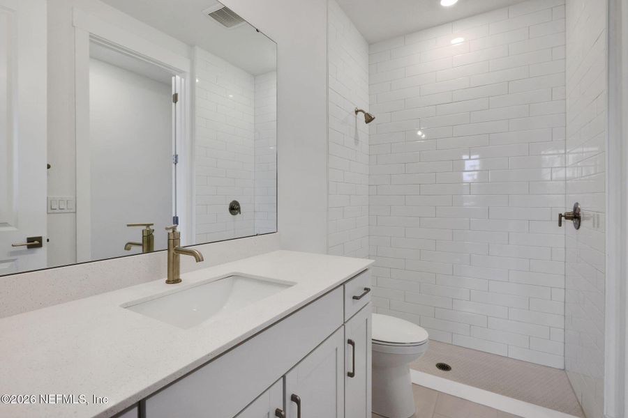 Furnished interior view inside a new home in North Beach Townhomes, Jacksonville Beach (Image 12).