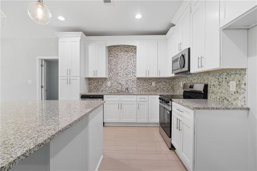 Furnished interior view inside a new home in , Gray (Image 17).
