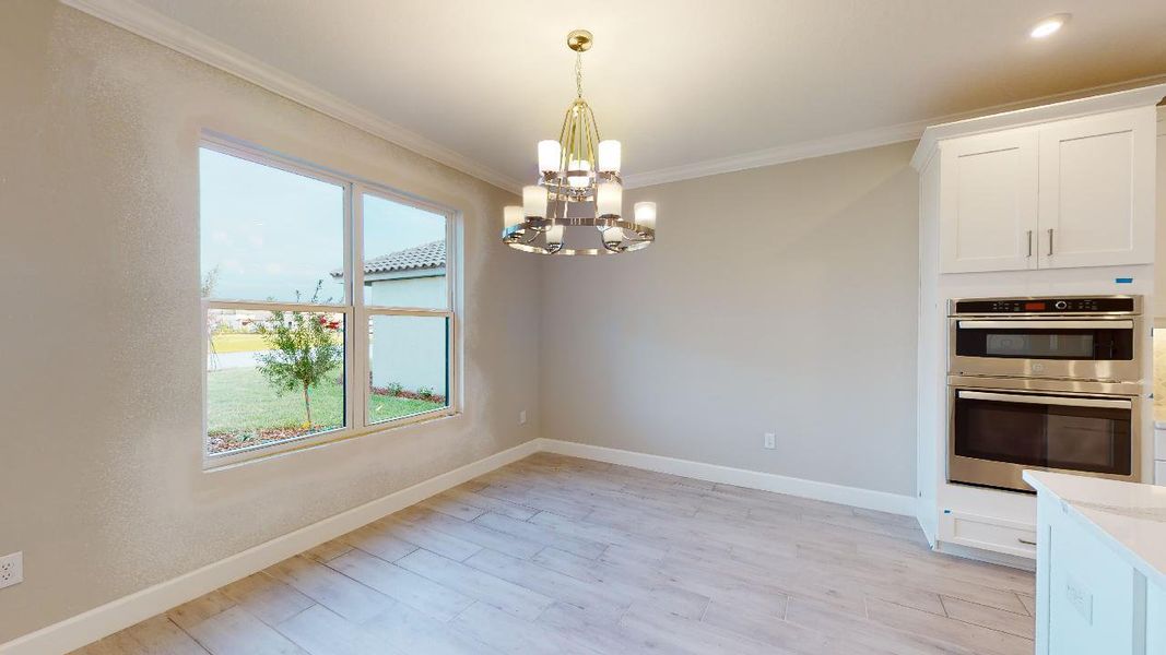 Representative unfurnished interior of a home built from the Azzurro by Taylor Morrison in Esplanade at Tradition, Port St. Lucie (Image 12).