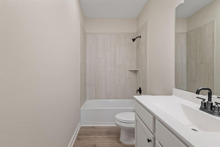 Furnished interior view inside a new home in Emberly, Beasley (Image 9).