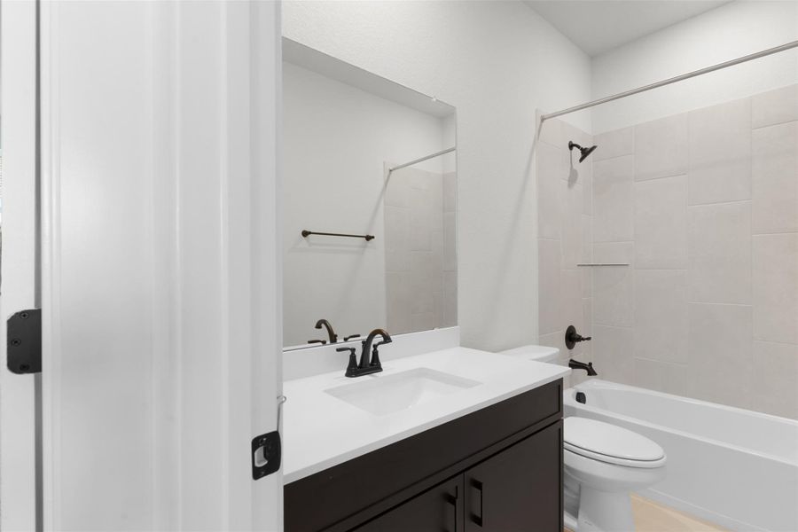 Bathroom with vanity and shower / bath combination Bathroom with vanity and shower / bath combination