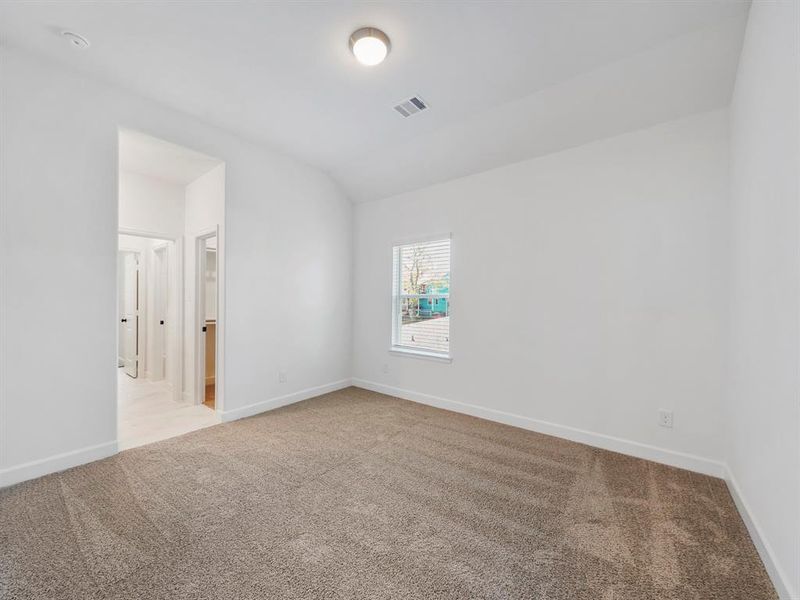 Another view of the secondary bedroom! (Sample photos of a completed Warwick floor plan. The image may feature alternative selections and/or upgrades.)