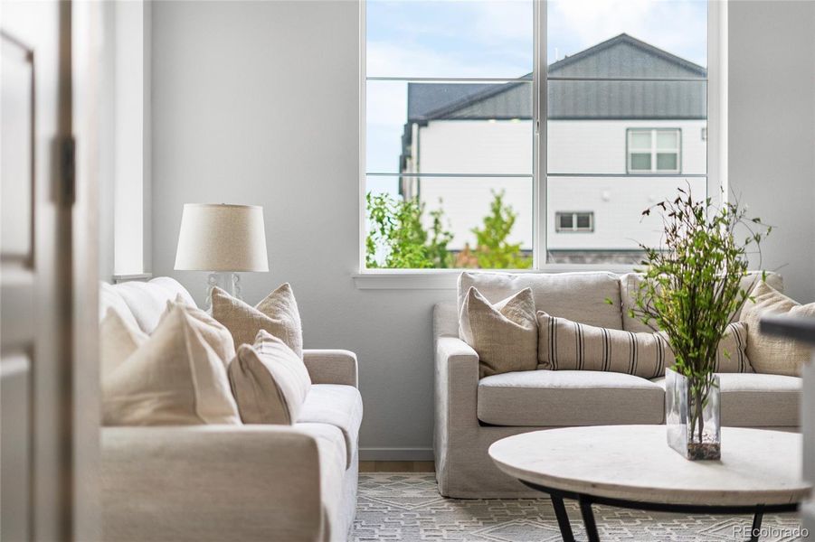 Furnished interior view inside a new home in Painted Prairie, Aurora (Image 8).
