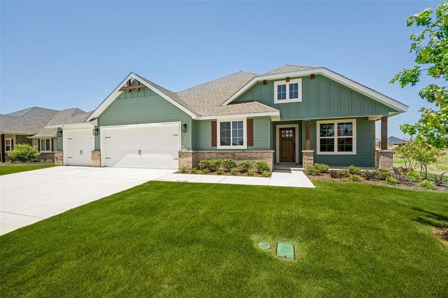 Front exterior of a new home in , Sanger, TX, highlighting curb appeal (Image 2). Front exterior of a new home in , Sanger, TX, highlighting curb appeal (Image 2).