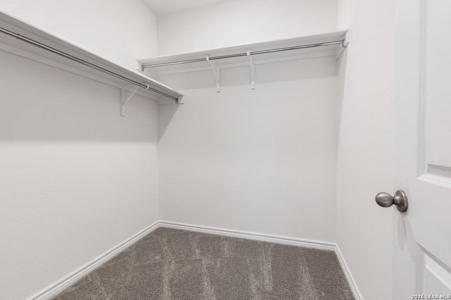 Spacious, unfurnished interior of a new home in Hidden Bluffs at TRP, San Antonio (Image 27).