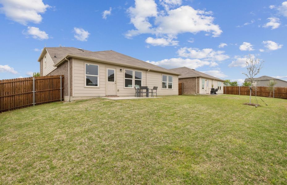 Fenced-in backyard Fenced-in backyard