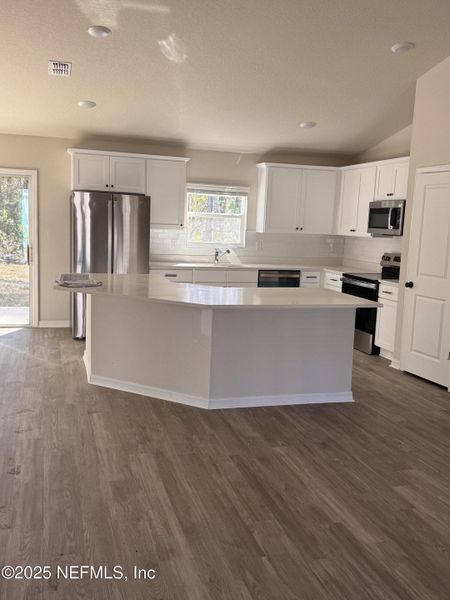 Spacious, unfurnished interior of a new home in , Palm Coast (Image 3). Spacious, unfurnished interior of a new home in , Palm Coast (Image 3).