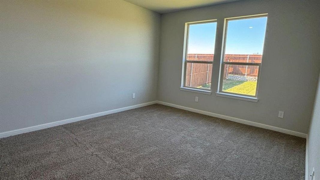 Spacious, unfurnished interior of a new home in Monarch at the Meadows, Ponder (Image 15).