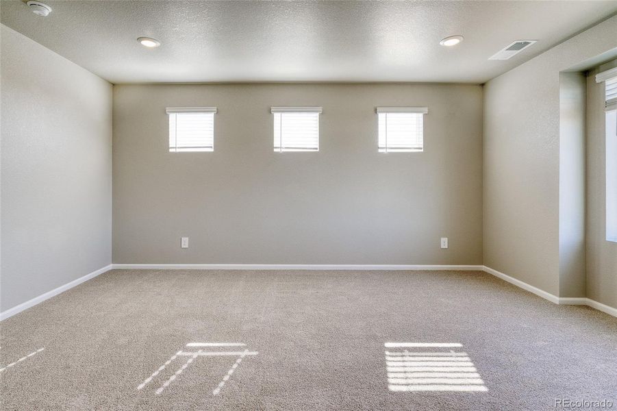 Spacious, unfurnished interior of a new home in Buffalo Highlands: The Flora Collection, Commerce City (Image 24).