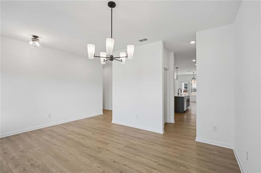 Spacious, unfurnished interior of a new home in Eastlyn Crossing, Flowery Branch (Image 17).