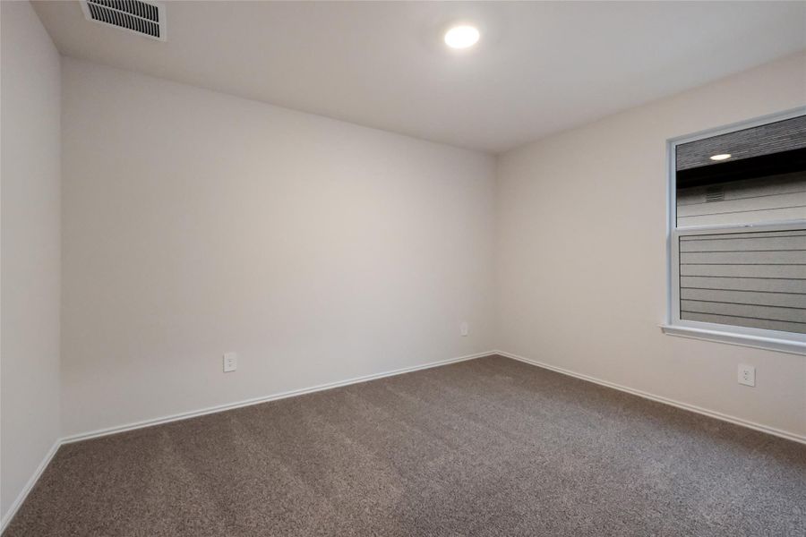 Spacious, unfurnished interior of a new home in Watermill, Uhland (Image 15).