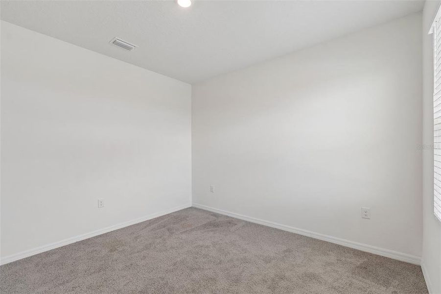 Spacious, unfurnished interior of a new home in Epperson, Wesley Chapel (Image 50).