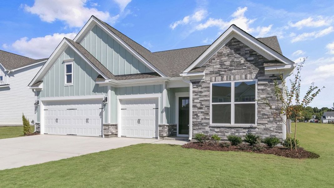 Representative exterior photo of a completed home built from the KATHRYN by D.R. Horton in Eagle Creek, Fuquay Varina, NC (Image 15).