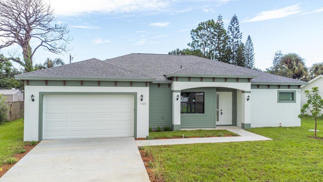 Front exterior of a new home in , Port St. Lucie, FL, highlighting curb appeal (Image 22).