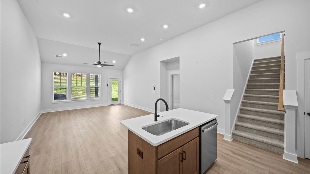 First-rate kitchen with a smaller island and superior cabinetry in a thoughtfully designed space