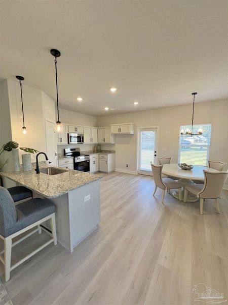Furnished interior view inside a new home in Allison Acres, Cantonment (Image 6).