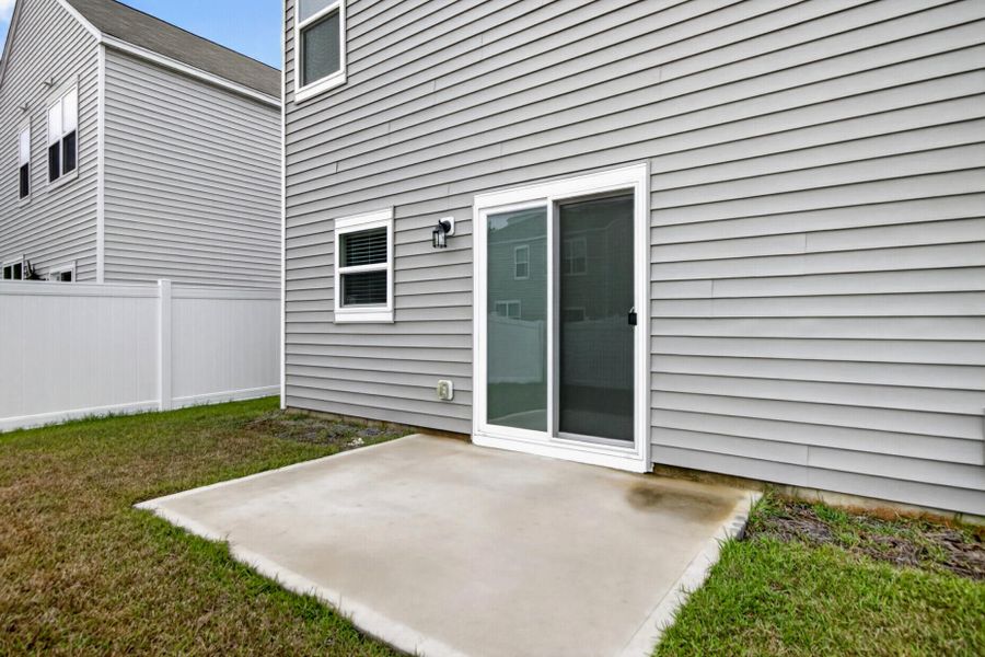 Exterior details and patio area of a home in Back River Bend, Goose Creek (Image 18).