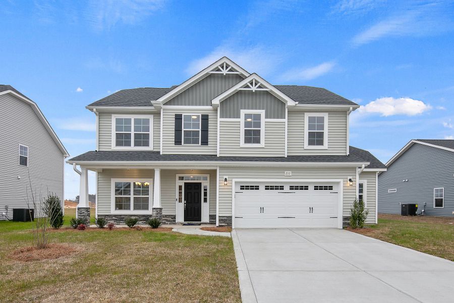Representative exterior photo of a completed home built from the Drayton by Caviness & Cates Communities in Maggie Way, Wendell, NC (Image 10).