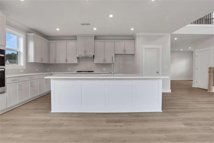 Furnished interior view inside a new home in The Paddocks at Doc Hughes, Buford (Image 8).