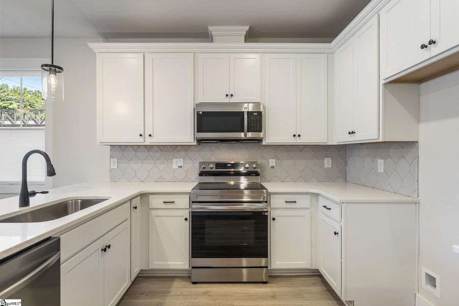 Furnished interior view inside a new home in Renaissance Place, Greenville (Image 2).