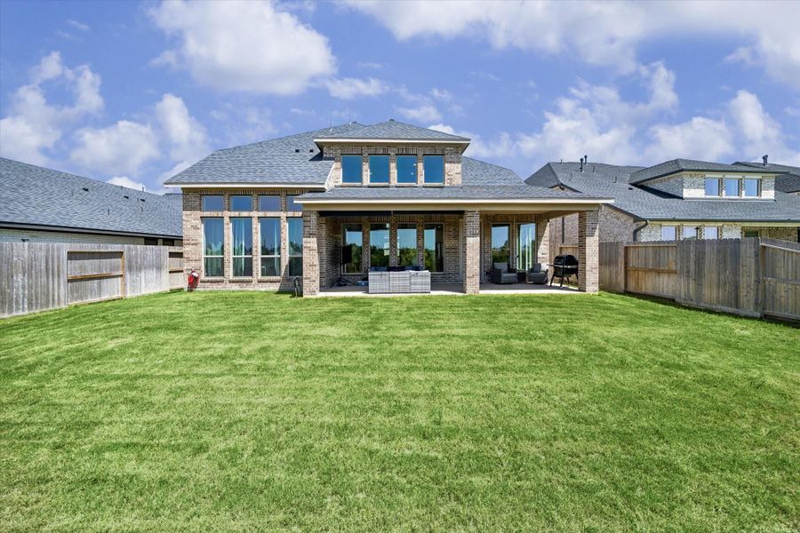 Exterior details and patio area of a home in Cross Creek West, Fulshear (Image 21).