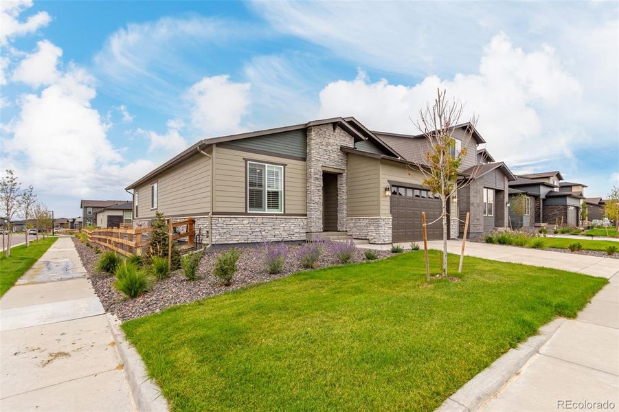 Front exterior of a new home in , Aurora, CO, highlighting curb appeal (Image 29).