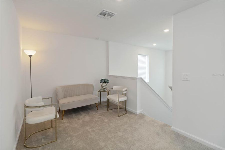 Furnished interior view inside a new home in Peace Creek Reserve: Manor Key Collection, Winter Haven (Image 17).
