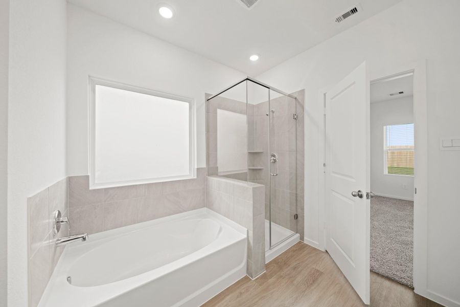 Furnished interior view inside a new home in Sunterra Lakes, Katy (Image 4).