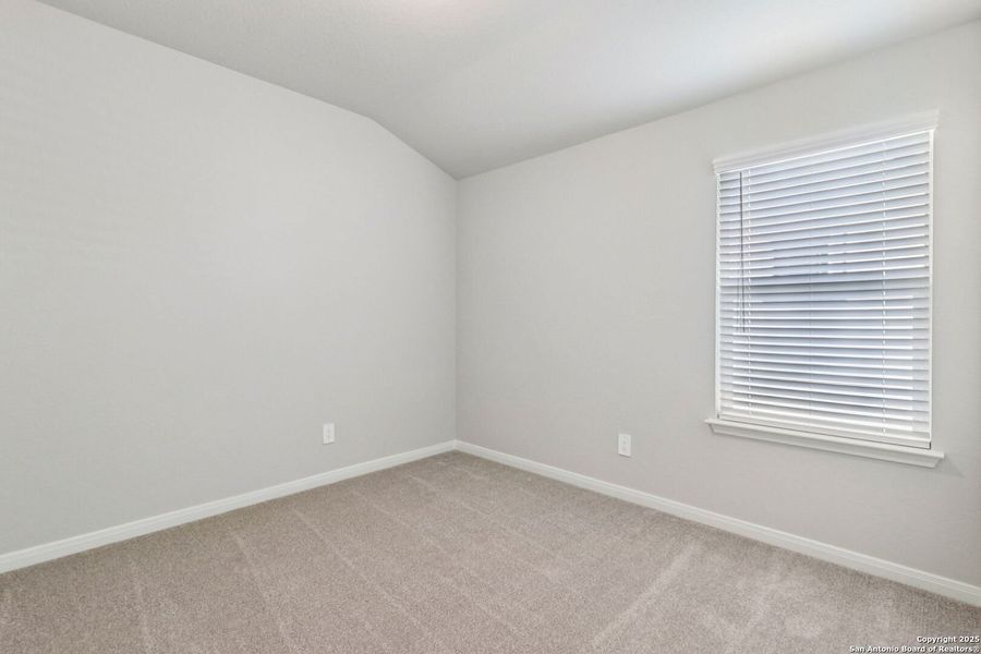 Spacious, unfurnished interior of a new home in Estancia Ranch - Premier Series, San Antonio (Image 37).