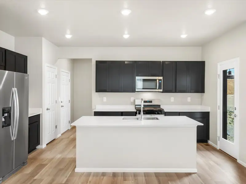 Furnished interior view inside a new home in Lorson Ranch: The Trail Collection, Colorado Springs (Image 3).