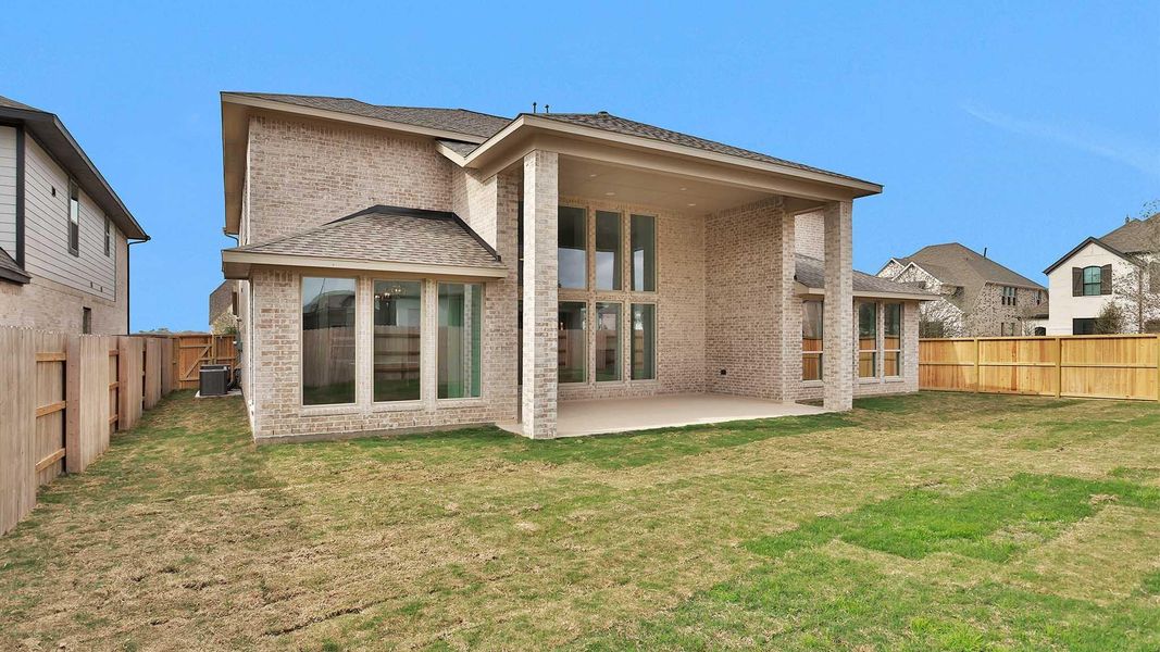 Exterior details and patio area of a home in Elyson 65', Katy (Image 4). Exterior details and patio area of a home in Elyson 65', Katy (Image 4).