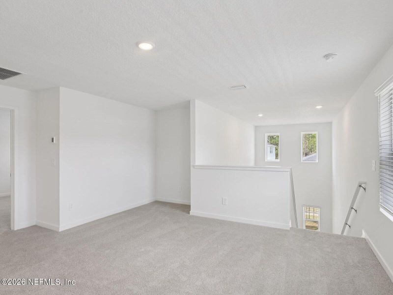 Spacious, unfurnished interior of a new home in Flagler Village - Classic Series, Palm Coast (Image 7). Spacious, unfurnished interior of a new home in Flagler Village - Classic Series, Palm Coast (Image 7).