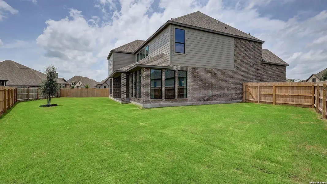 Exterior details and patio area of a home in Alsatian Oaks, Castroville (Image 4).