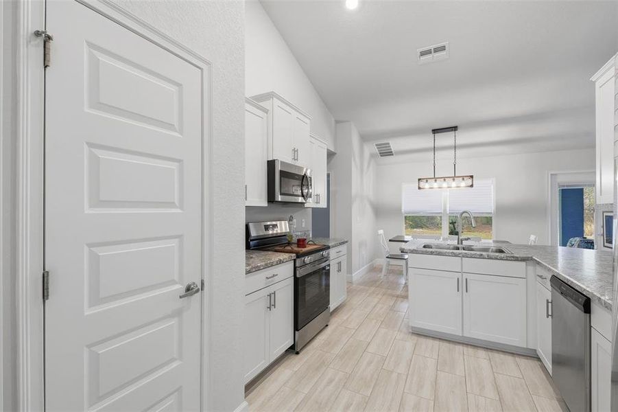 Furnished interior view inside a new home in Royal Highlands, Weeki Wachee (Image 9).