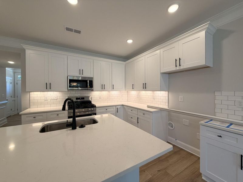 Furnished interior view inside a new home in Harrisburg Village Townhomes, Harrisburg (Image 7).